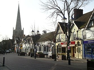 quiet shopping street, and church with large spire
